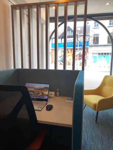 Single pod hot desk with view of the street